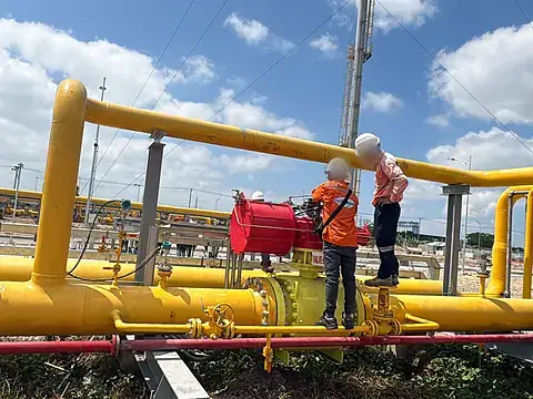 Technicians working at a gas distribution station